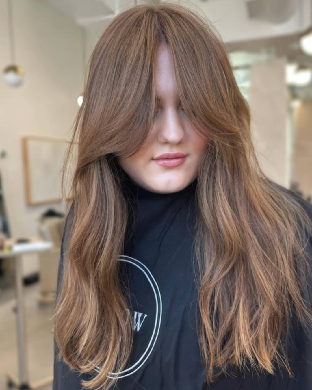 Long Layers with Curtain Bangs by Alyssa